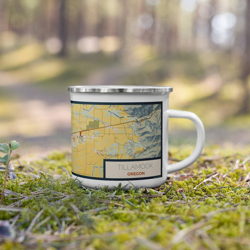 Right View Custom Tillamook Oregon Map Enamel Mug in Woodblock on Grass With Trees in Background