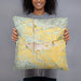 Person holding 18x18 Custom Tillamook Oregon Map Throw Pillow in Woodblock
