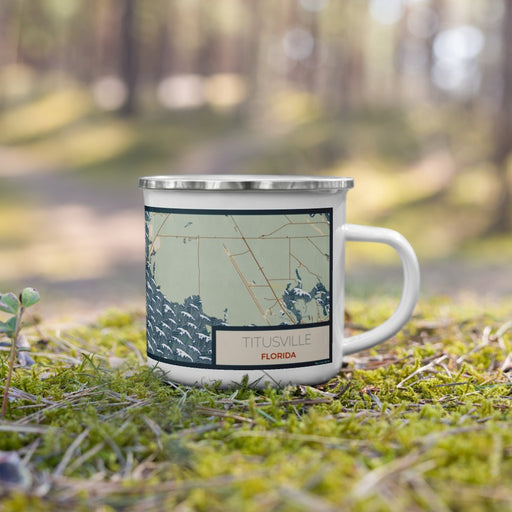 Right View Custom Titusville Florida Map Enamel Mug in Woodblock on Grass With Trees in Background