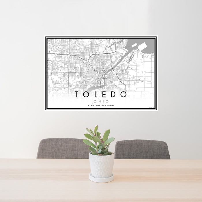 24x36 Toledo Ohio Map Print Landscape Orientation in Classic Style Behind 2 Chairs Table and Potted Plant