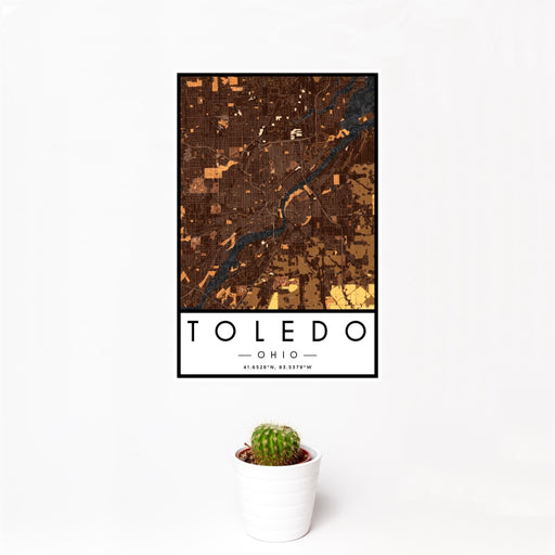 12x18 Toledo Ohio Map Print Portrait Orientation in Ember Style With Small Cactus Plant in White Planter