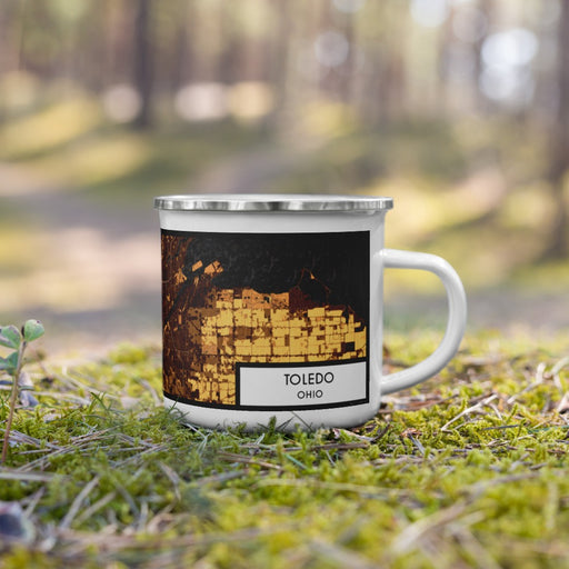 Right View Custom Toledo Ohio Map Enamel Mug in Ember on Grass With Trees in Background