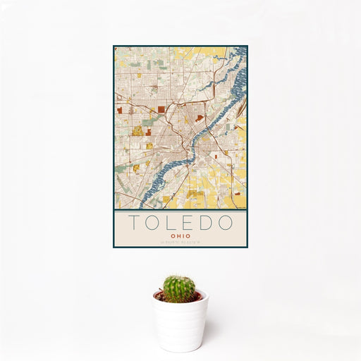 12x18 Toledo Ohio Map Print Portrait Orientation in Woodblock Style With Small Cactus Plant in White Planter