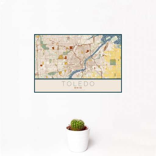12x18 Toledo Ohio Map Print Landscape Orientation in Woodblock Style With Small Cactus Plant in White Planter