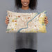 Person holding 20x12 Custom Toledo Ohio Map Throw Pillow in Woodblock