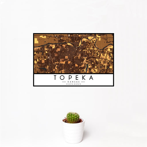 12x18 Topeka Kansas Map Print Landscape Orientation in Ember Style With Small Cactus Plant in White Planter