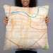Person holding 22x22 Custom Topeka Kansas Map Throw Pillow in Watercolor