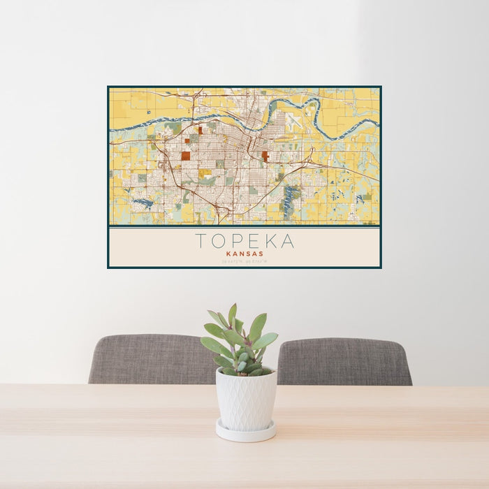 24x36 Topeka Kansas Map Print Landscape Orientation in Woodblock Style Behind 2 Chairs Table and Potted Plant