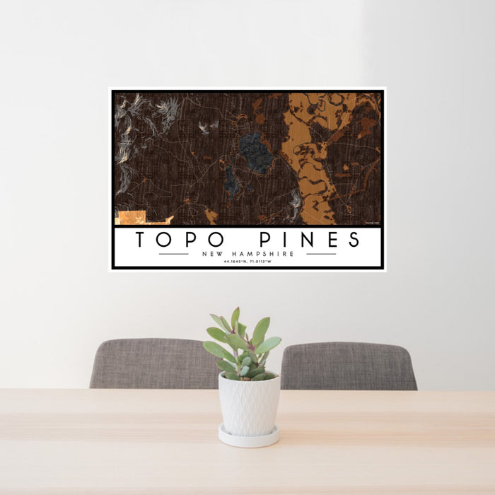 24x36 Topo Pines New Hampshire Map Print Lanscape Orientation in Ember Style Behind 2 Chairs Table and Potted Plant