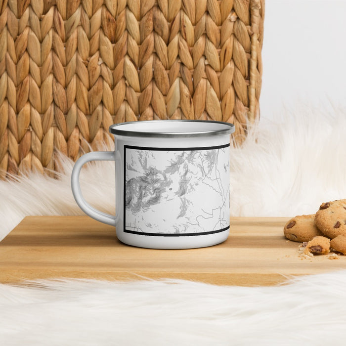 Left View Custom Topo Pines New Hampshire Map Enamel Mug in Classic on Table Top