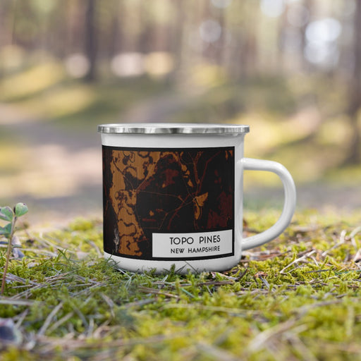 Right View Custom Topo Pines New Hampshire Map Enamel Mug in Ember on Grass With Trees in Background