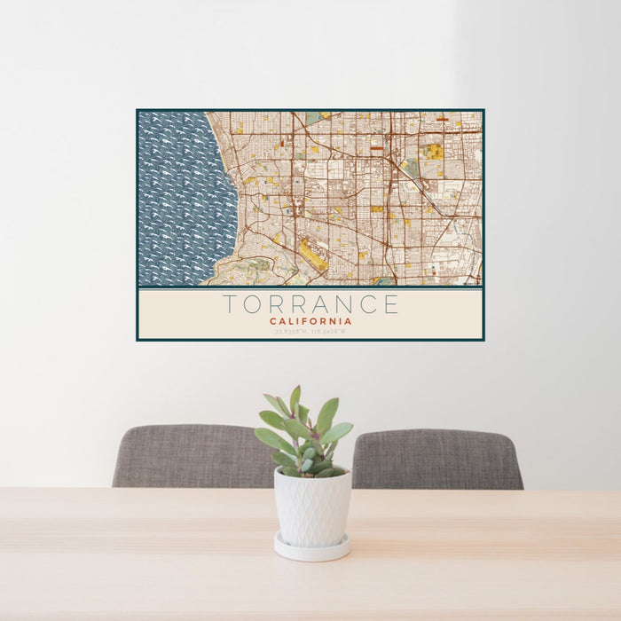 24x36 Torrance California Map Print Lanscape Orientation in Woodblock Style Behind 2 Chairs Table and Potted Plant