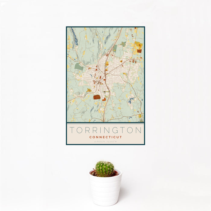 12x18 Torrington Connecticut Map Print Portrait Orientation in Woodblock Style With Small Cactus Plant in White Planter