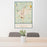 24x36 Torrington Connecticut Map Print Portrait Orientation in Woodblock Style Behind 2 Chairs Table and Potted Plant