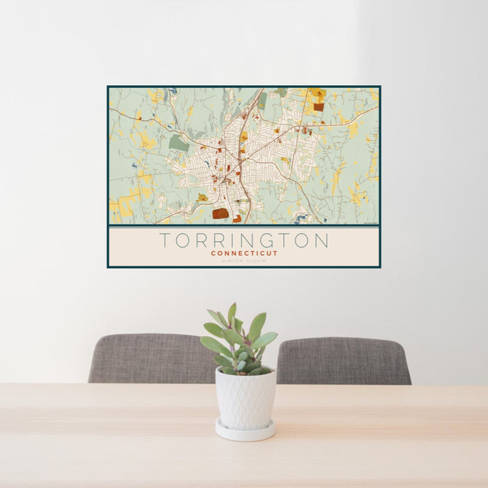24x36 Torrington Connecticut Map Print Landscape Orientation in Woodblock Style Behind 2 Chairs Table and Potted Plant