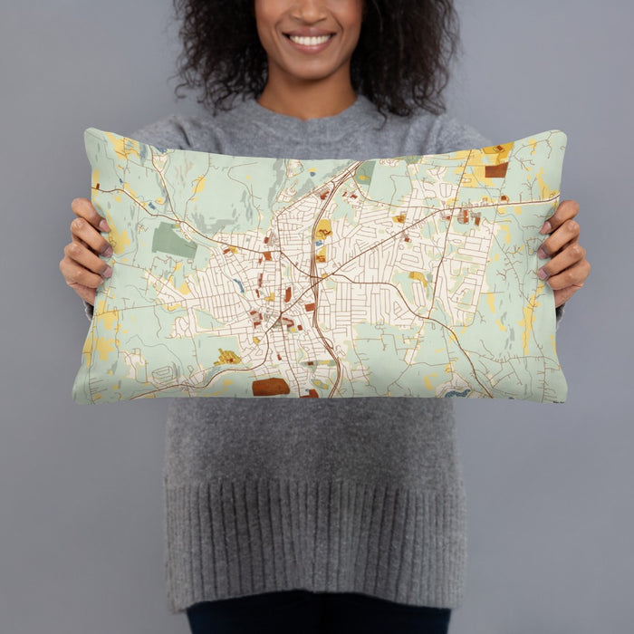 Person holding 20x12 Custom Torrington Connecticut Map Throw Pillow in Woodblock