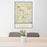 24x36 Travelers Rest South Carolina Map Print Portrait Orientation in Woodblock Style Behind 2 Chairs Table and Potted Plant