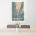 24x36 Traverse City Michigan Map Print Portrait Orientation in Afternoon Style Behind 2 Chairs Table and Potted Plant