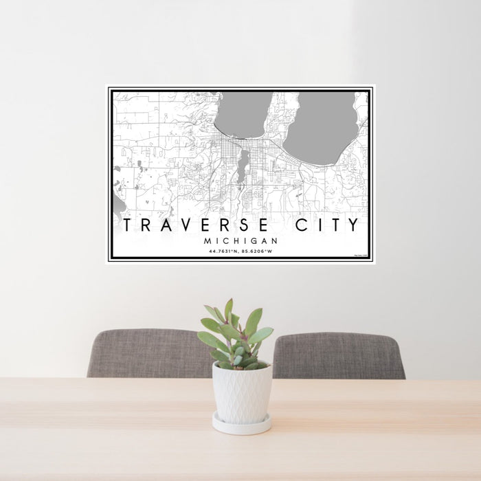24x36 Traverse City Michigan Map Print Lanscape Orientation in Classic Style Behind 2 Chairs Table and Potted Plant