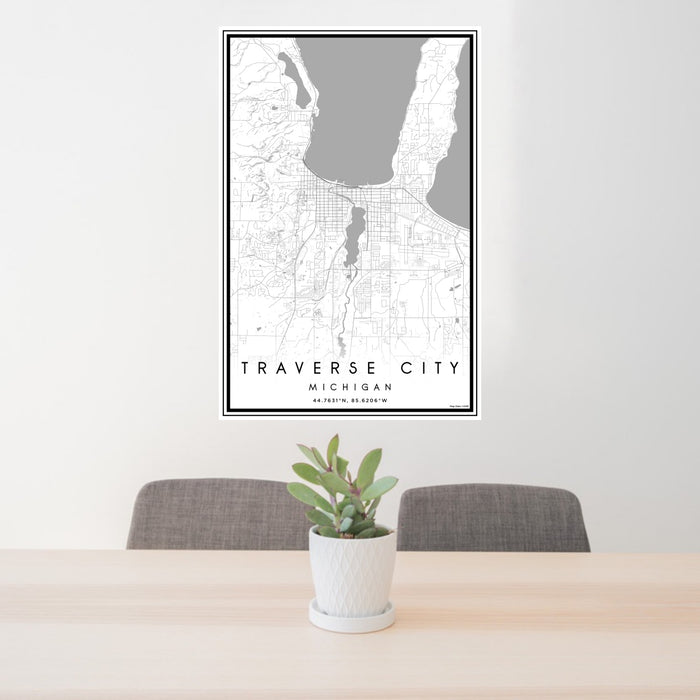 24x36 Traverse City Michigan Map Print Portrait Orientation in Classic Style Behind 2 Chairs Table and Potted Plant
