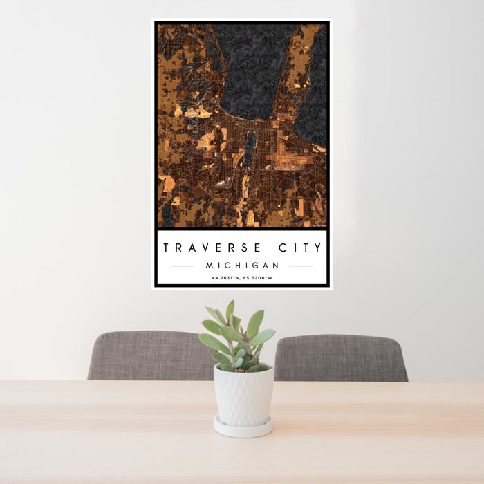 24x36 Traverse City Michigan Map Print Portrait Orientation in Ember Style Behind 2 Chairs Table and Potted Plant