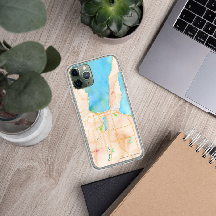 Custom Traverse City Michigan Map Phone Case in Watercolor on Table with Laptop and Plant