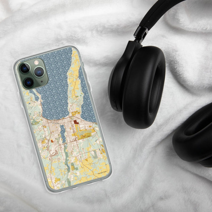 Custom Traverse City Michigan Map Phone Case in Woodblock on Table with Black Headphones