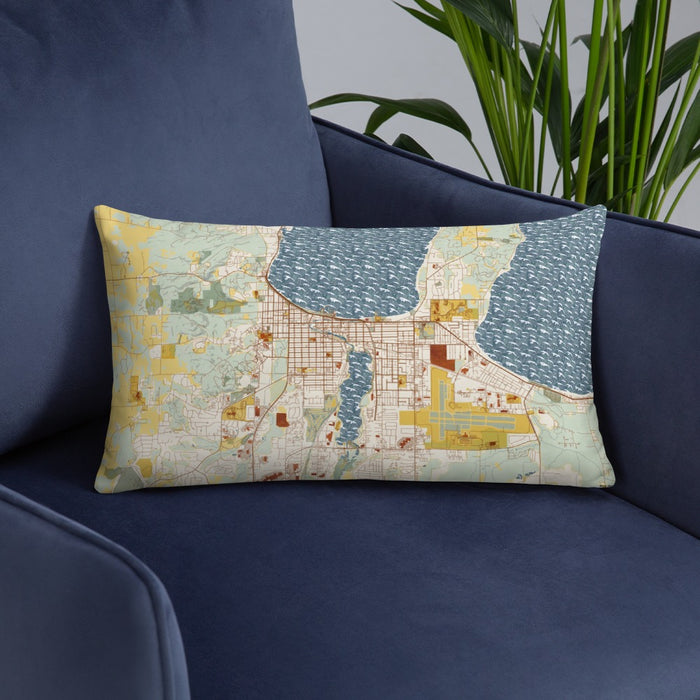 Custom Traverse City Michigan Map Throw Pillow in Woodblock on Blue Colored Chair