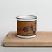 Front View Custom Trenton Illinois Map Enamel Mug in Ember on Cutting Board