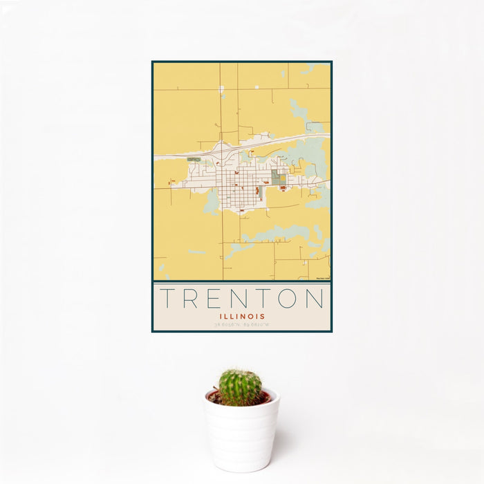 12x18 Trenton Illinois Map Print Portrait Orientation in Woodblock Style With Small Cactus Plant in White Planter