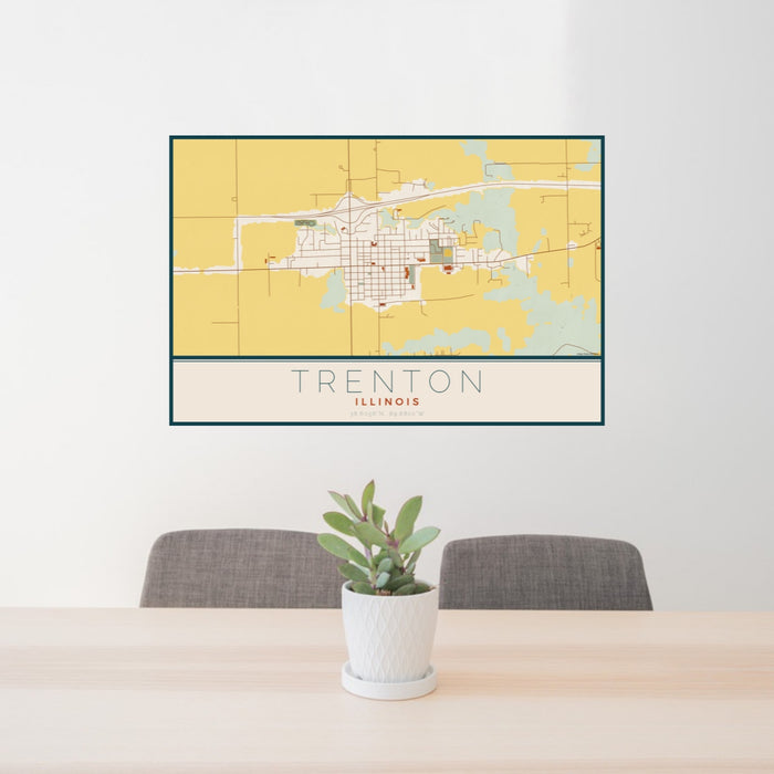 24x36 Trenton Illinois Map Print Landscape Orientation in Woodblock Style Behind 2 Chairs Table and Potted Plant