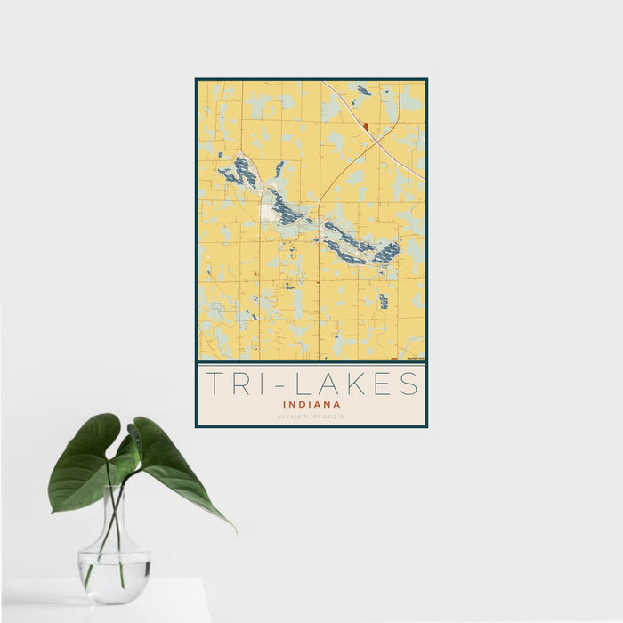 16x24 Tri-Lakes Indiana Map Print Portrait Orientation in Woodblock Style With Tropical Plant Leaves in Water