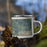 Right View Custom Tri-Lakes Indiana Map Enamel Mug in Afternoon on Grass With Trees in Background