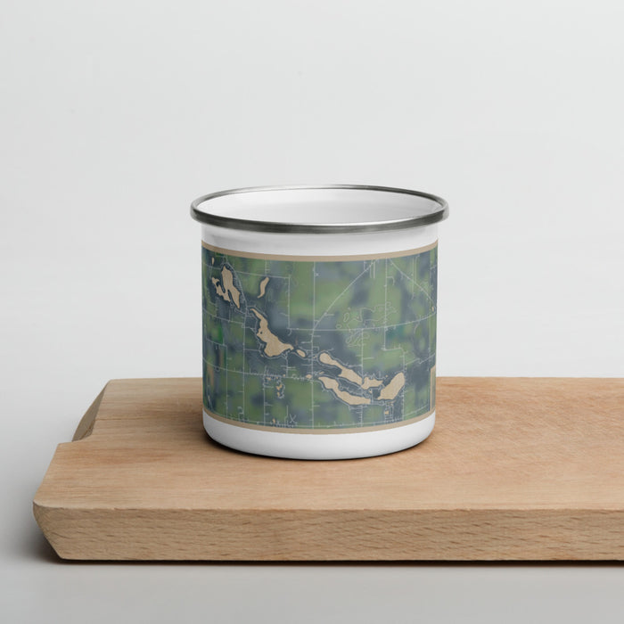 Front View Custom Tri-Lakes Indiana Map Enamel Mug in Afternoon on Cutting Board