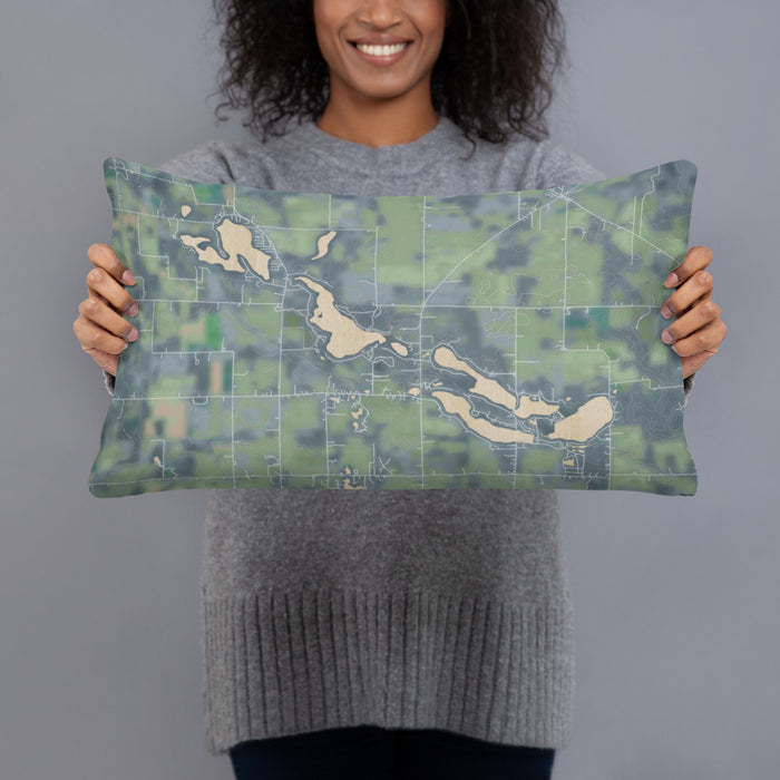 Person holding 20x12 Custom Tri-Lakes Indiana Map Throw Pillow in Afternoon