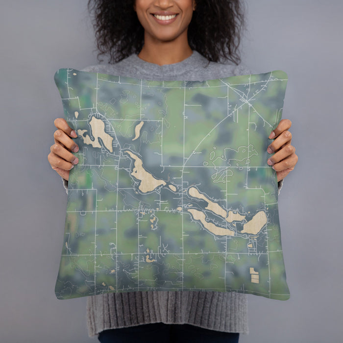 Person holding 18x18 Custom Tri-Lakes Indiana Map Throw Pillow in Afternoon