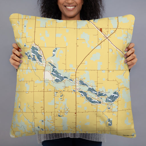 Person holding 22x22 Custom Tri-Lakes Indiana Map Throw Pillow in Woodblock