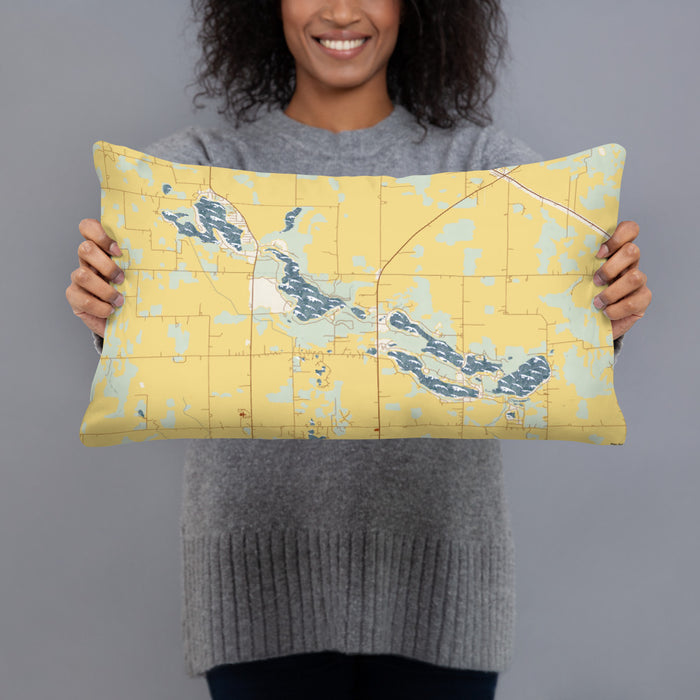 Person holding 20x12 Custom Tri-Lakes Indiana Map Throw Pillow in Woodblock