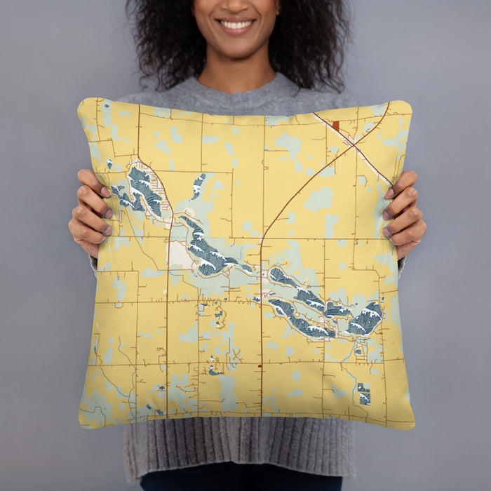 Person holding 18x18 Custom Tri-Lakes Indiana Map Throw Pillow in Woodblock