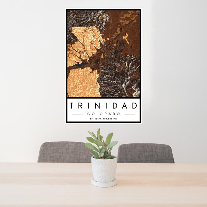 24x36 Trinidad Colorado Map Print Portrait Orientation in Ember Style Behind 2 Chairs Table and Potted Plant
