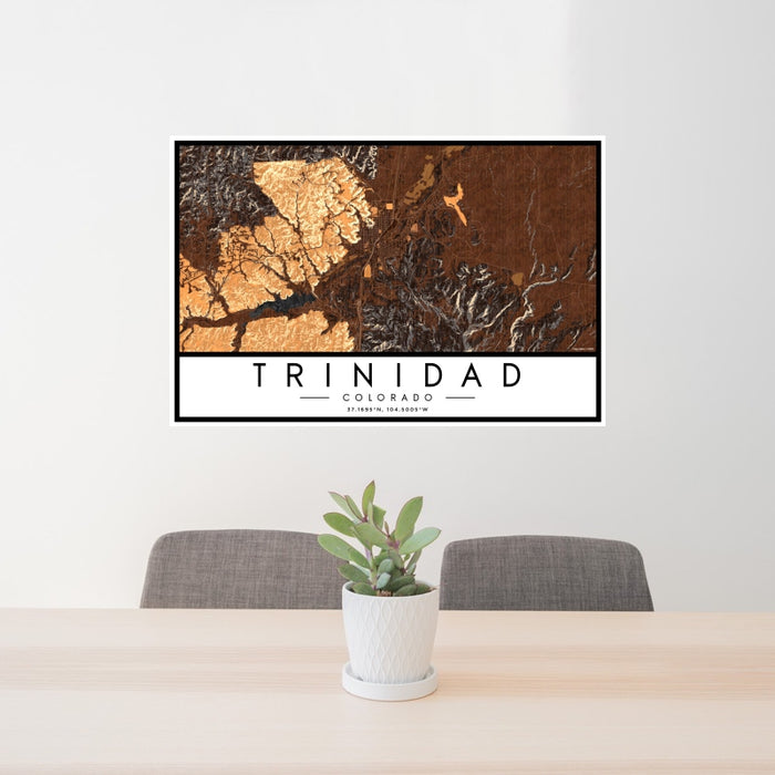 24x36 Trinidad Colorado Map Print Landscape Orientation in Ember Style Behind 2 Chairs Table and Potted Plant