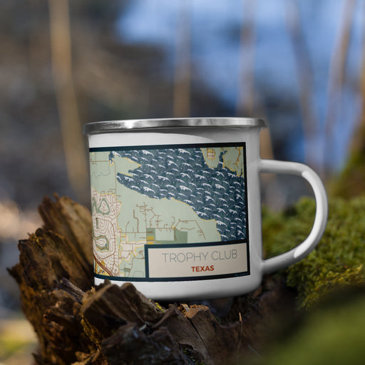 Right View Custom Trophy Club Texas Map Enamel Mug in Woodblock on Grass With Trees in Background