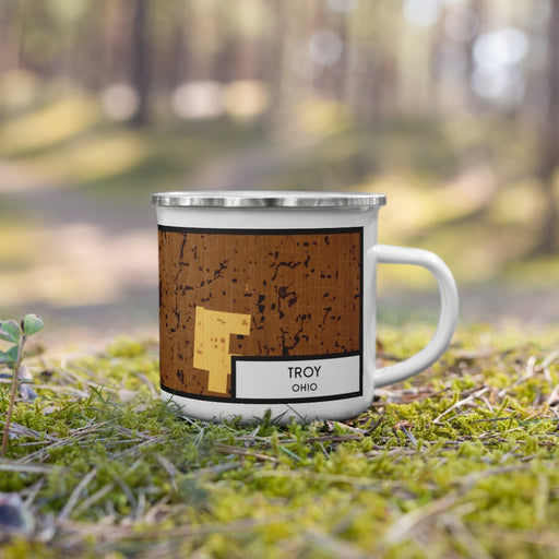 Right View Custom Troy Ohio Map Enamel Mug in Ember on Grass With Trees in Background