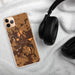 Custom Troy Ohio Map Phone Case in Ember on Table with Black Headphones