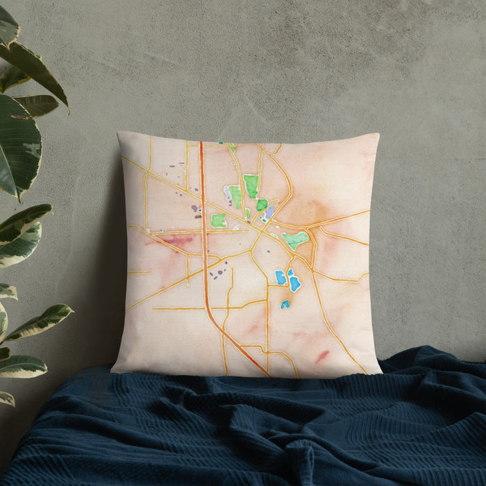 Custom Troy Ohio Map Throw Pillow in Watercolor on Bedding Against Wall