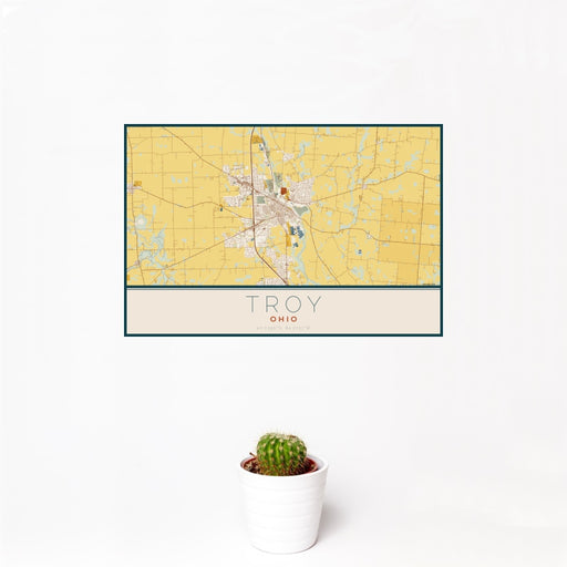 12x18 Troy Ohio Map Print Landscape Orientation in Woodblock Style With Small Cactus Plant in White Planter