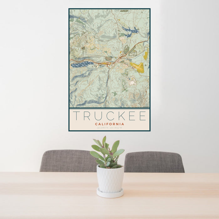 24x36 Truckee California Map Print Portrait Orientation in Woodblock Style Behind 2 Chairs Table and Potted Plant