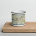 Front View Custom Truckee California Map Enamel Mug in Woodblock on Cutting Board