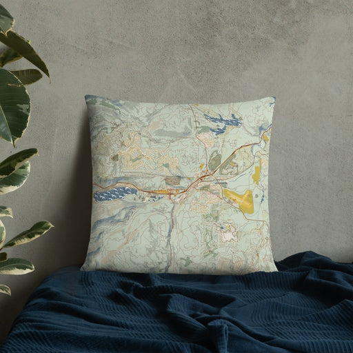 Custom Truckee California Map Throw Pillow in Woodblock on Bedding Against Wall