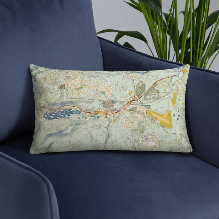 Custom Truckee California Map Throw Pillow in Woodblock on Blue Colored Chair